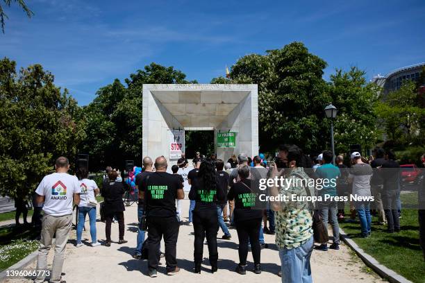 Several people at a rally in support of victims of domestic violence, at the Jardines del Monumento a la Constitucion, on May 8 in Madrid, Spain. The...