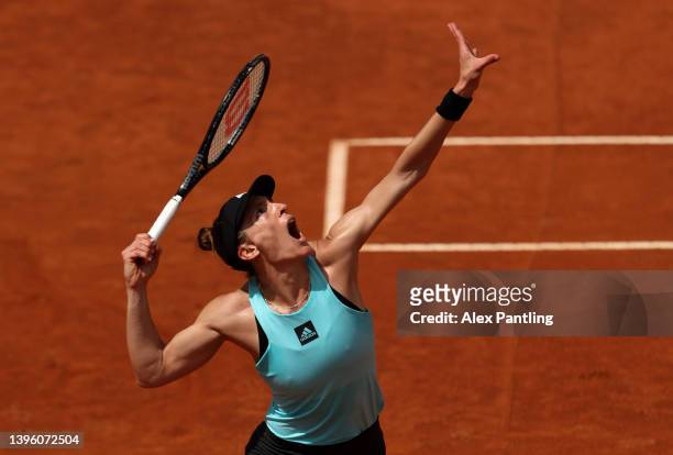 Andrea Petkovic of Germany serves during their women's singles qualifying second round match against Aliaksandra Sasnovich of Belarus on day one of...