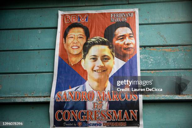 Poster featuring former president Ferdinand E. Marcos, presidential candidate Ferdinand "Bongbong" Marcos Jr., and his son Sandro Marcos is seen in a...