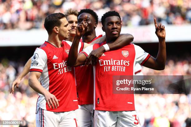 Eddie Nketiah of Arsenal celebrates scoring their side's first goal with teammates during the Premier League match between Arsenal and Leeds United...