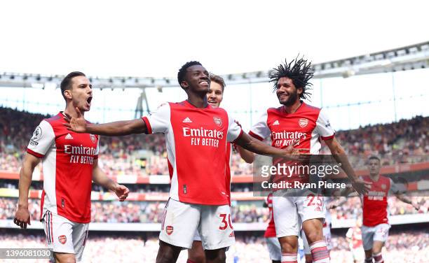 Eddie Nketiah of Arsenal celebrates scoring their side's second goal with teammates during the Premier League match between Arsenal and Leeds United...