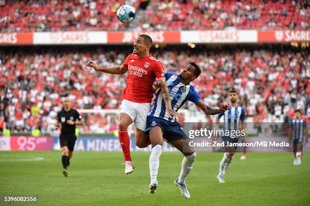 Wenderson Galen of Porto and Gilberto Moraes Junior of Benfica challenge for the ball during the Liga Portugal Bwin match between SL Benfica and FC...