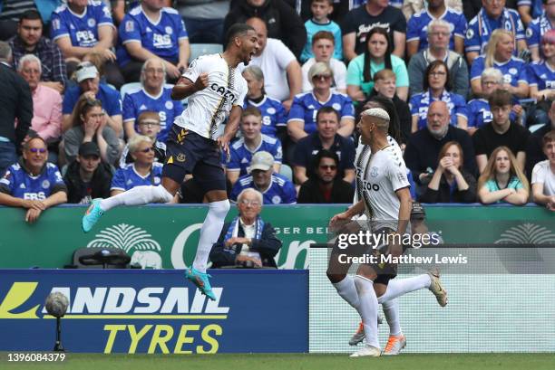 Mason Holgate celebrates with Richarlison of Everton after scoring their team's second goal during the Premier League match between Leicester City...