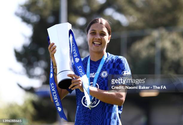 Sam Kerr of Chelsea lifts the Barclays Women's Super League trophy following their side's victory during the Barclays FA Women's Super League match...