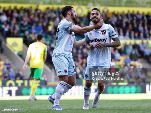 Manuel Lanzini celebrates with Said Benrahma of West Ham United after scoring their team's fourth goal from the penalty spot during the Premier...