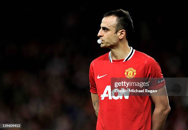 Dimitar Berbatov of Manchester United looks on prior to the UEFA Europa League Round of 32 second leg match between Manchester United and AFC Ajax at...