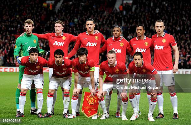 The Manchester United players line up for a team photo prior to the UEFA Europa League Round of 32 second leg match between Manchester United and AFC...