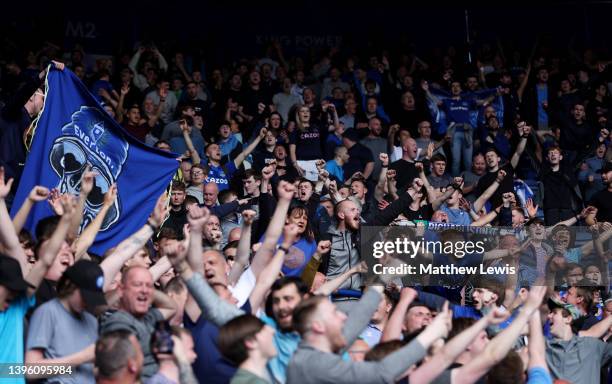 Everton fans celebrate after their sides victory during the Premier League match between Leicester City and Everton at The King Power Stadium on May...