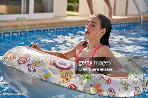Tween Floating Inpool Teenager Girl Enjoy Floating In Inflatable Ring On Water Outdoors ...