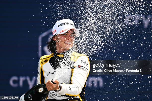 Race winner Jamie Chadwick of Great Britain and Jenner Racing celebrates on the podium during race 2 of W Series Round 1 at Miami International...