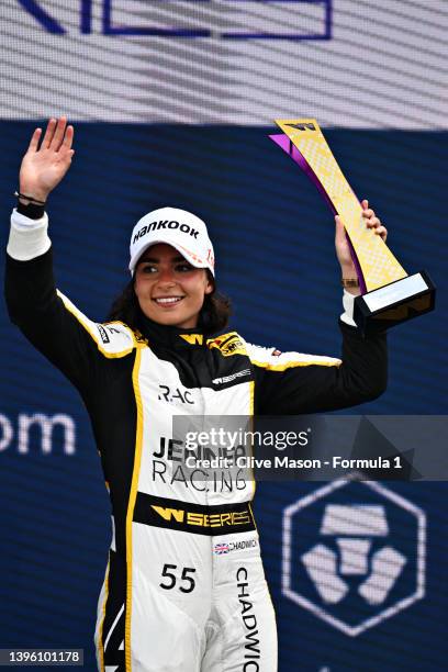 Race winner Jamie Chadwick of Great Britain and Jenner Racing celebrates on the podium during race 2 of W Series Round 1 at Miami International...