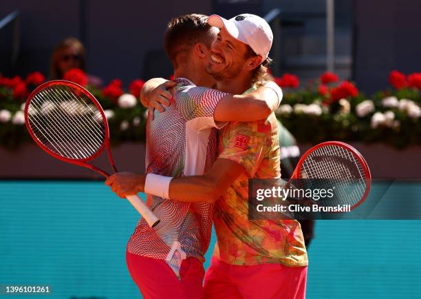 Wesley Koolhof of The Netherlands and Neal Skupski of Great Britain celebrate after their victory in the men's doubles final at La Caja Magica on May...