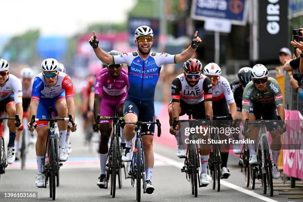 Mark Cavendish of United Kingdom and Team Quick-Step - Alpha Vinyl celebrates winning ahead of Arnaud Demare of France and Team Groupama - FDJ, Hailu...