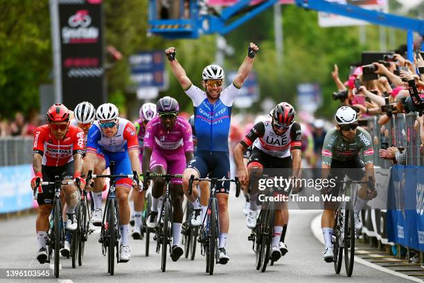 Mark Cavendish of United Kingdom and Team Quick-Step - Alpha Vinyl celebrates winning ahead of Caleb Ewan of Australia and Team Lotto Soudal, Arnaud...