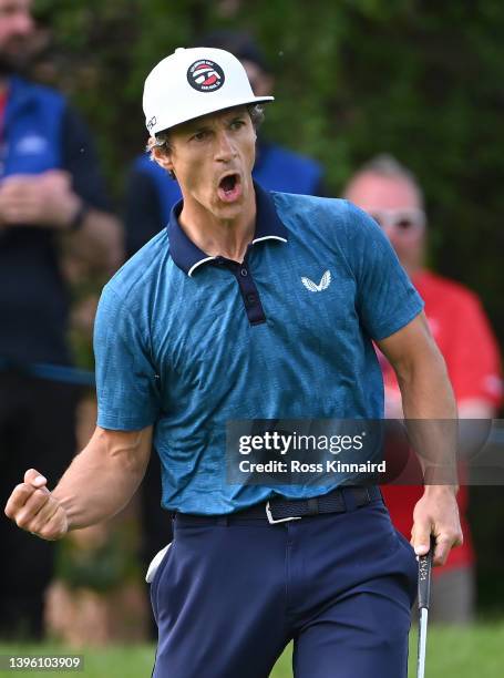 Thorbjorn Olesen of Denmark celebrates an eagle on the 17th green during the final round of the Betfred British Masters hosted by Danny Willett at...