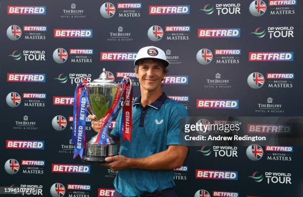 Thorbjorn Olesen of Denmark poses with the trophy after winning the Betfred British Masters hosted by Danny Willett at The Belfry on May 08, 2022 in...