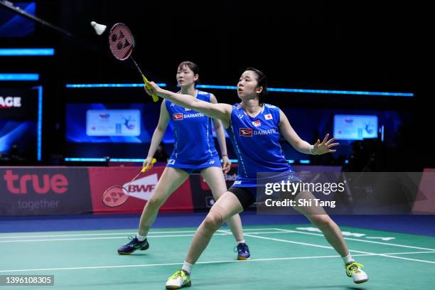 Mayu Matsumoto and Wakana Nagahara of Japan compete in the Women's Double match against Linda Efler and Emma Moszczynski of Germany during day one on...