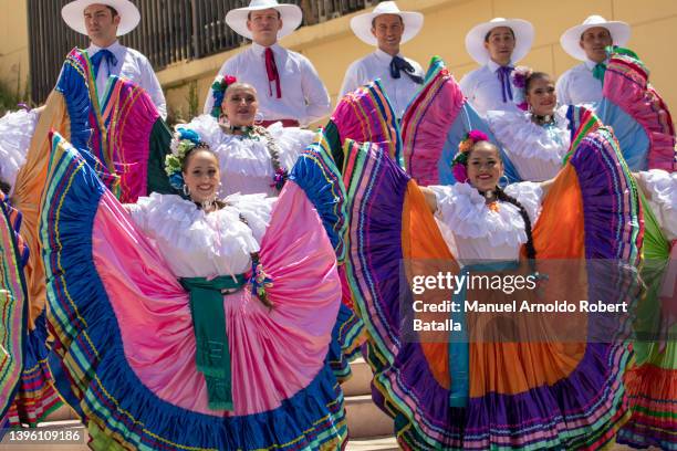Young Adults greet guests in national costume of Costa Rica during the presidential inauguration ceremony at Legislative Assembly building on May 8,...