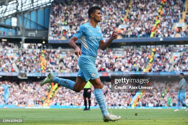 Rodri of Manchester City celebrates scoring their side's third goal during the Premier League match between Manchester City and Newcastle United at...