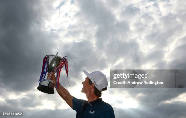 Thorbjorn Olesen of Denmark poses with the trophy after winning the Betfred British Masters hosted by Danny Willett at The Belfry on May 08, 2022 in...