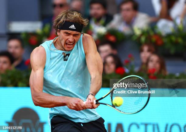 Alexander Zverev of Germany plays a backhand shot in the men's singles final match at La Caja Magica on May 08, 2022 in Madrid, Spain.