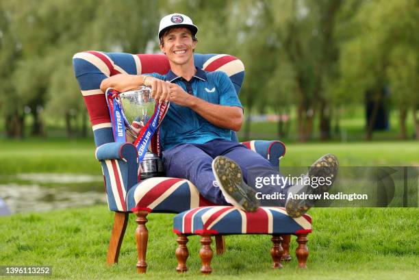 Thorbjorn Olesen of Denmark poses with the trophy after winning the Betfred British Masters hosted by Danny Willett at The Belfry on May 08, 2022 in...