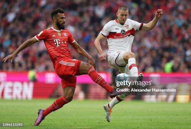 Eric Maxim Choupo-Moting of FC Bayern Muenchen battles for possession with Waldemar Anton of VfB Stuttgart during the Bundesliga match between FC...