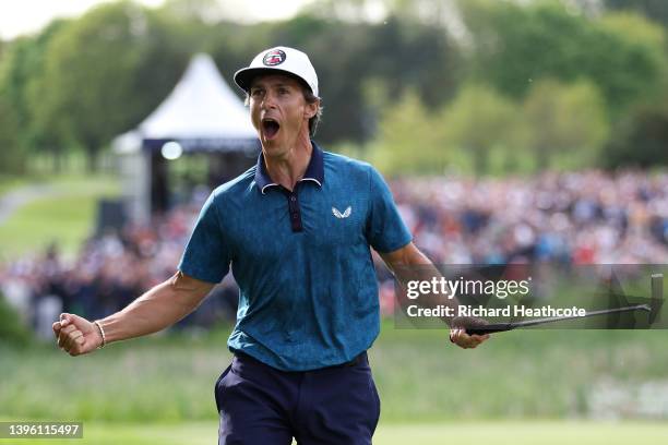 Thorbjorn Olesen of Denmark celebrates as he holes a birdie putt on the 18th green to win the Betfred British Masters hosted by Danny Willett at The...