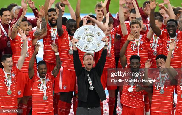 Julian Nagelsmann, Head Coach of FC Bayern Muenchen lifts The Bundesliga Meisterschale trophy following their sides finish as Bundesliga champions...