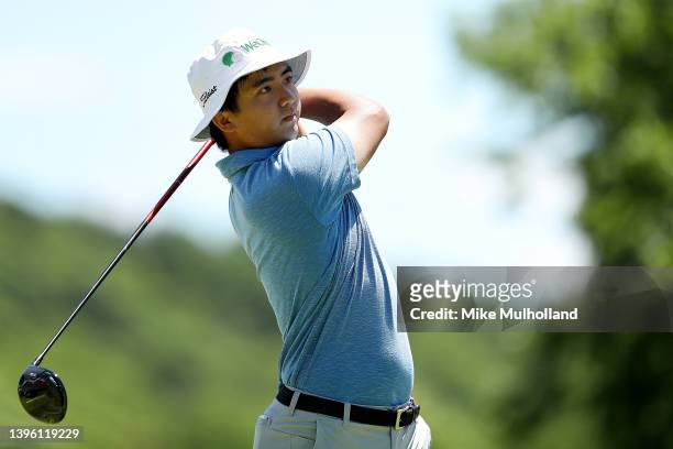 Zecheng Dou of China hits his tee shot on the first hole during the final round of the Simmons Bank Open for the Snedeker Foundation at The Grove on...