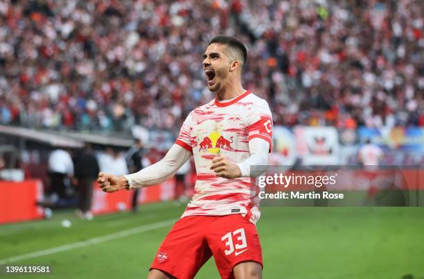 Andre Miguel Valente da Silva of Red Bull Leipzig celebrates after scoring a goal during the Bundesliga match between RB Leipzig and FC Augsburg at...