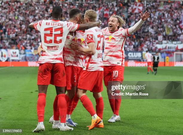 Andre Miguel Valente da Silva of Red Bull Leipzig is congratulated by Emil Forsberg of Red Bull Leipzig after scoring a goal during the Bundesliga...