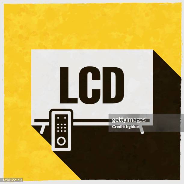 lcd tv. icon with long shadow on textured yellow background - lcd screen texture stock illustrations