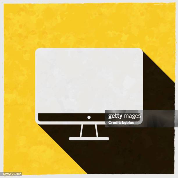 desktop computer. icon with long shadow on textured yellow background - lcd screen texture stock illustrations