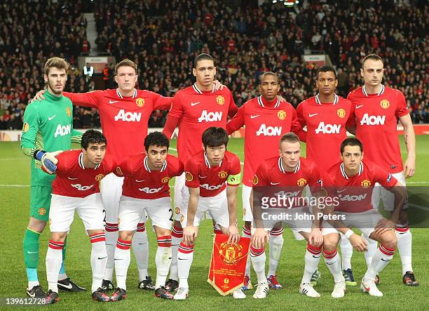 The Manchester United team line up ahead of UEFA Europa League round of 32 second leg match at Old Trafford on February 23, 2012 in Manchester,...