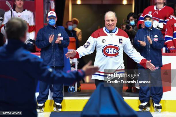 Bob Gainey gives a hug to Montreal Canadiens head equipment manager, Pierre Gervais, who is working his final NHL game tonight at the Bell Centre on...