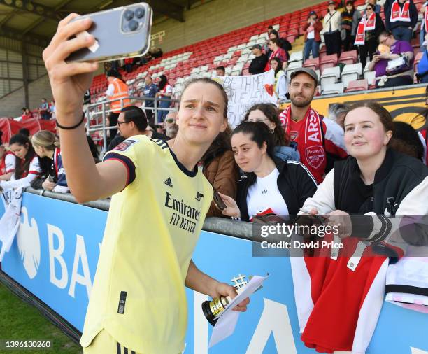 Vivianne Miedema of Arsenal takes a selfie with a fan after the Barclays FA Women's Super League match between West Ham United Women and Arsenal...