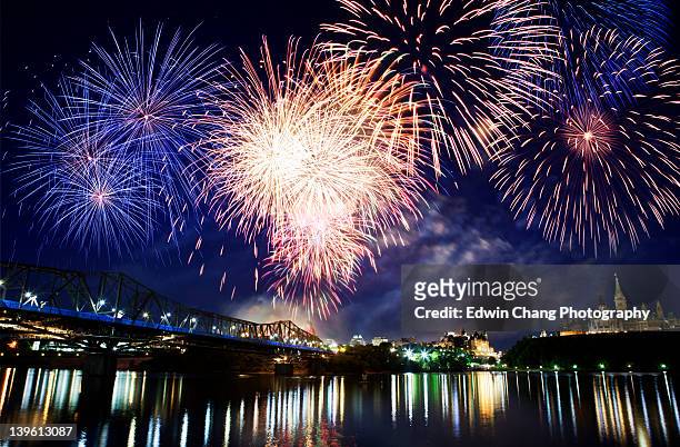 fireworks on canada day reflection on rideau canal - canada day stock-fotos und bilder