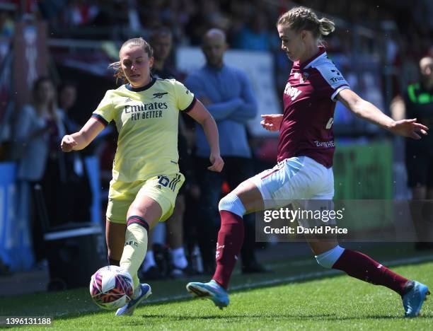 Noelle Maritz of Arsenal is closed down by Dagny Brynjarsdottir of West Ham during the Barclays FA Women's Super League match between West Ham United...