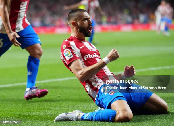 Yannick Ferreira Carrasco of Atletico Madrid celebrates scoring their side's first goal from a penalty during the La Liga Santander match between...