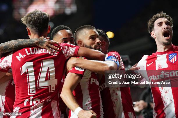 Yannick Ferreira Carrasco of Atletico Madrid celebrates scoring their side's first goal from a penalty with teammates during the La Liga Santander...