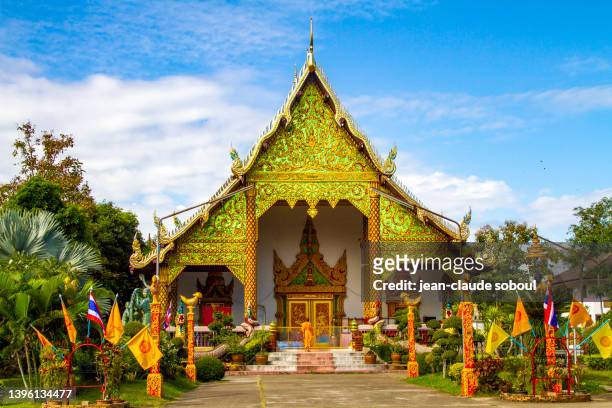 the "wat chatupon" in chiang rai city (thailand) - chiang rai province stock pictures, royalty-free photos & images