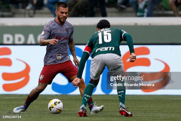 Gustavo Gomez of Palmeiras competes for the ball with Nathan of Fluminense during the match between Palmeiras and Fluminense as part of Brasileirao...