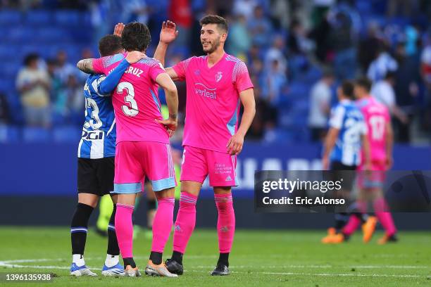 David Garcia, Juan Cruz of CA Osasuna salutes Adrian Embarba of RCD Espanyol during the La Liga Santander match between RCD Espanyol and CA Osasuna...