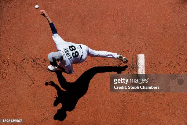 George Kirby of the Seattle Mariners warms up in the bullpen before the game against Tampa Bay Rays at T-Mobile Park on May 08, 2022 in Seattle,...
