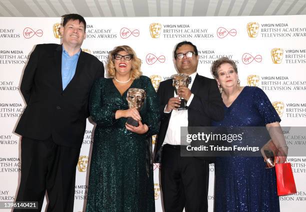 Mark Labbett, Jenny Ryan, Paul Sinha and Anne Hegerty, accepting the Daytime award for "The Chase", pose in the press room at the Virgin Media...