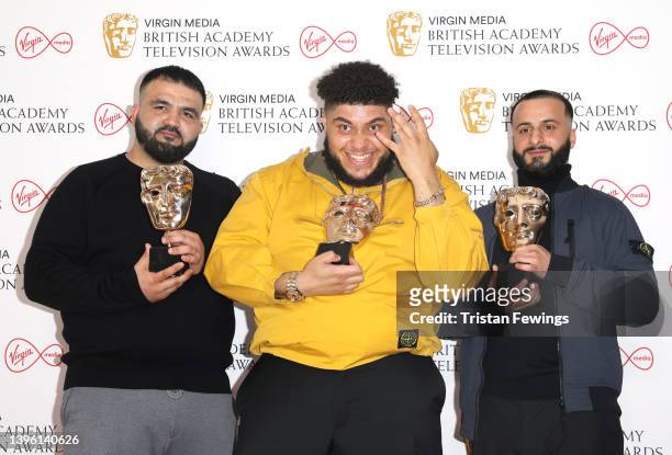 Tubsey, Big Zuu and Hyder, winners of the Features award for "Big Zuu's Big Eats", pose in the press room at the Virgin Media British Academy...