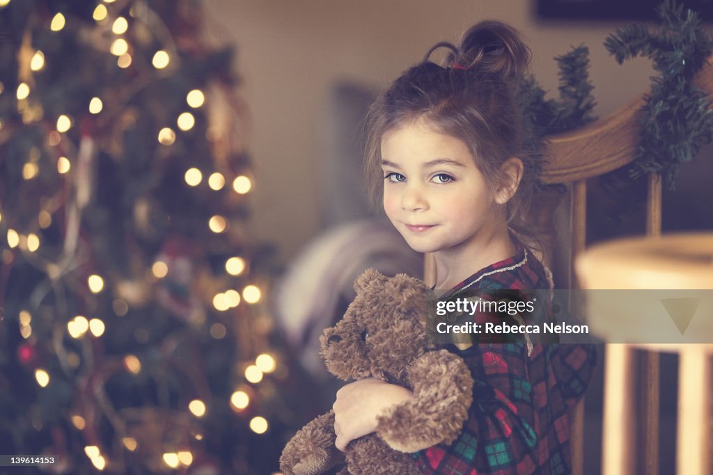 Girl holding teddy