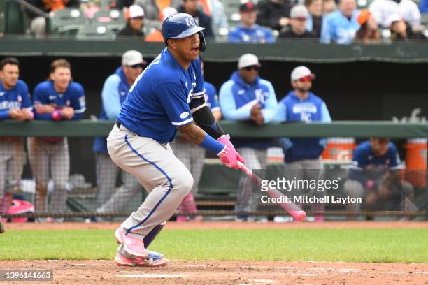 Salvador Perez of the Kansas City Royals singles in a run in the ninth inning during game one of a doubleheader baseball game against the Baltimore...