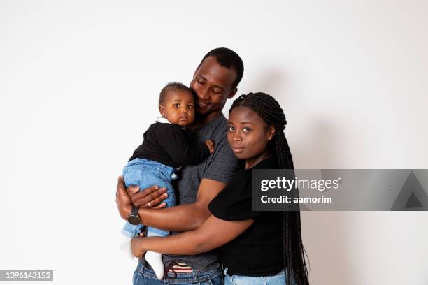 black family with one child - mother on white background stock pictures, royalty-free photos & images